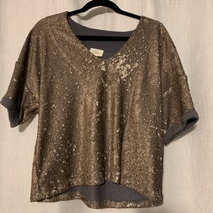 Woman’s bronze sequin top